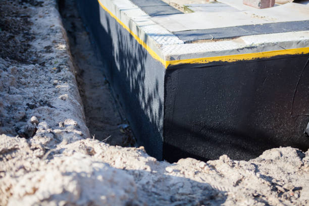 Professional Wet Basement Repair technician working in Hillsboro, KS